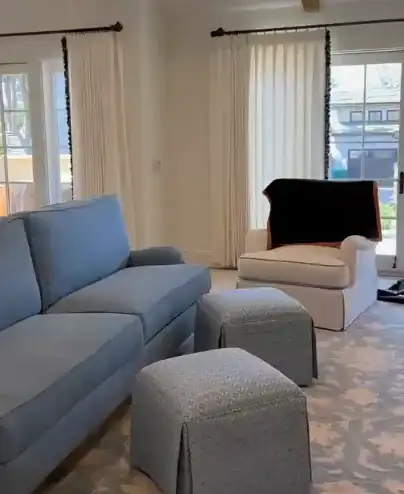 Custom drapery installed in a bright living room