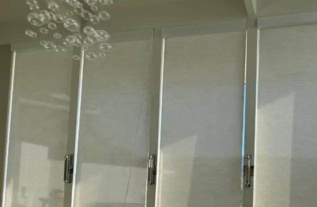 Sheer shades installed across a row of windows